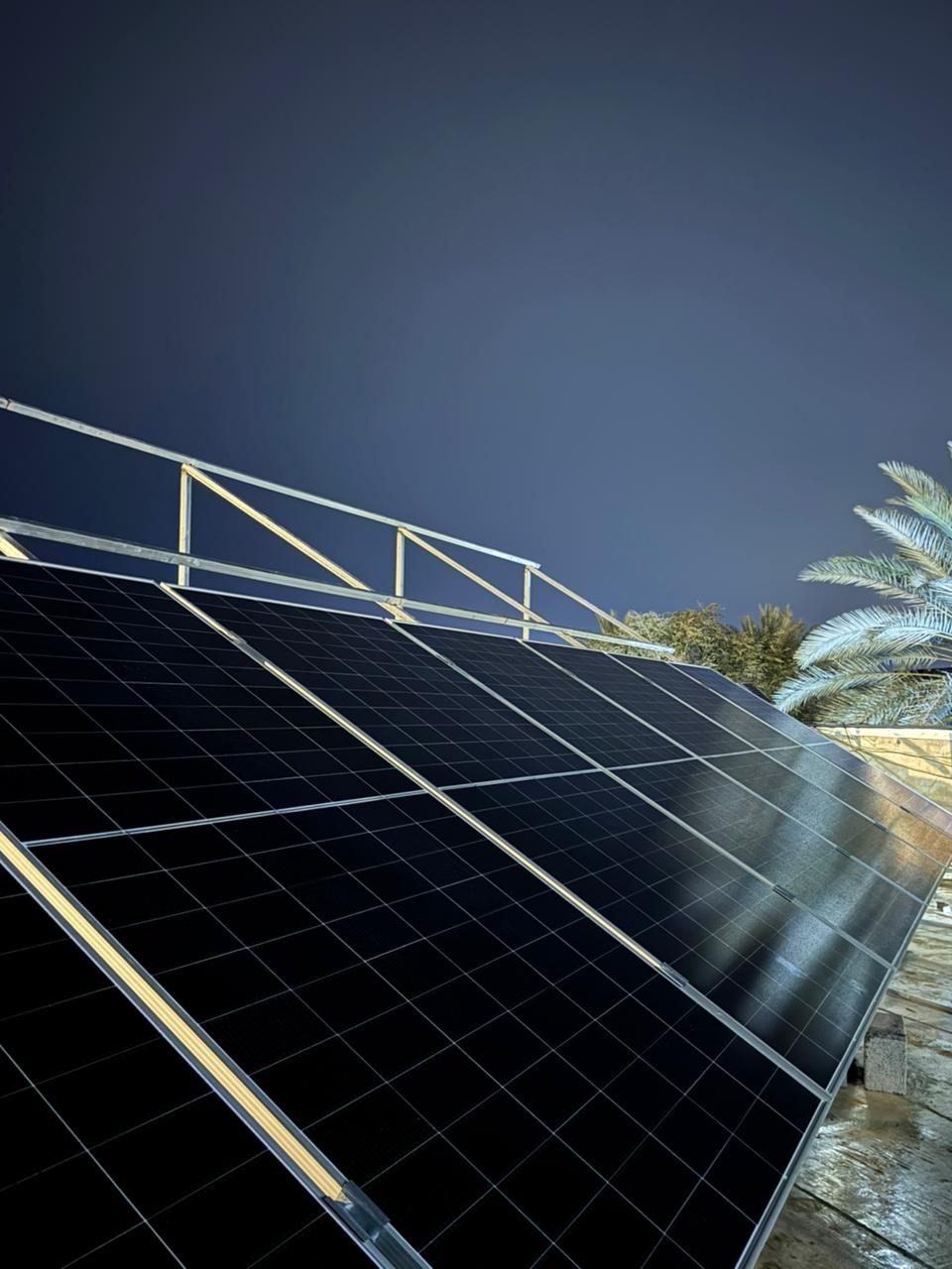 Rooftop solar panels in Anbar, Iraq photographed at night